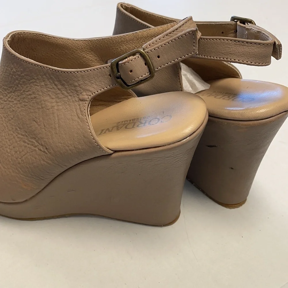 Cordani peep toe leather wedges